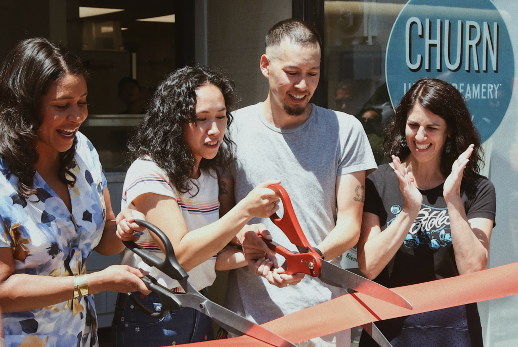 Ribbon cutting ceremony for Churn Ice Cream grand opening